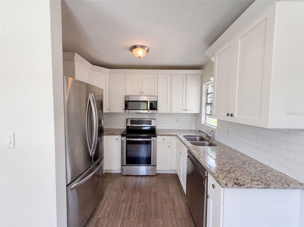 Photo of 2406 E Curtis Street, Tampa, FL 33610 (MLS # O6441837)