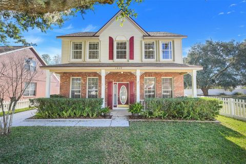 Photo of 1033 Woodflower Way, Clermont, FL 34714 (MLS # O6370215)