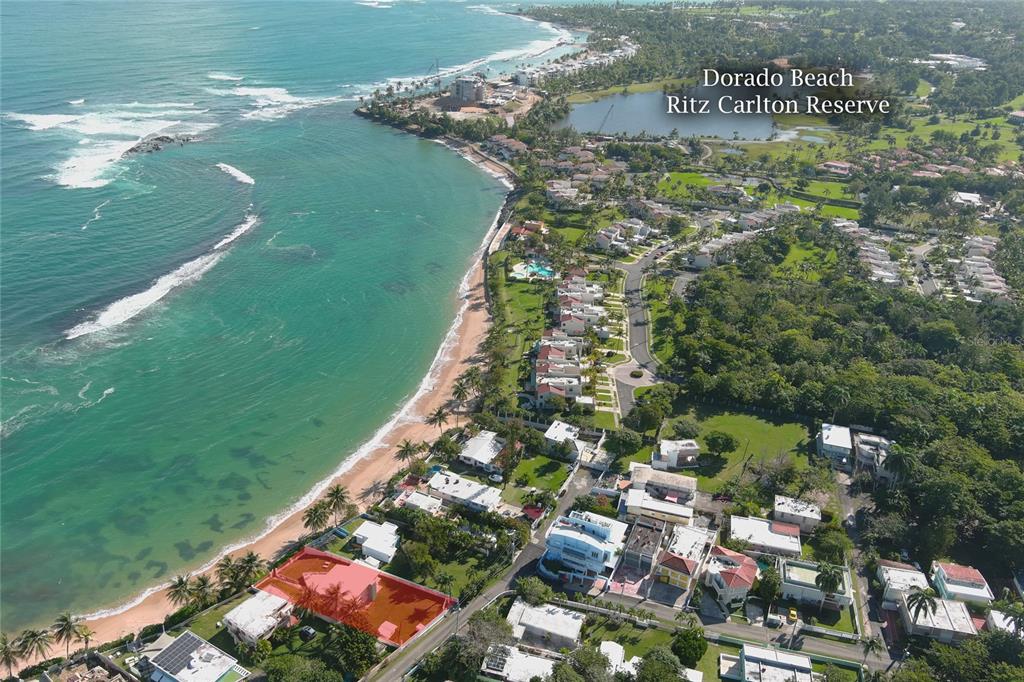Enjoy a lifestyle like no other in this unique beachfront house nestled on a secluded beach between the Ritz Carlton DORADO BEACH resort and the upcoming new Ritz at the old Cerromar hotel property. Renovate this charming home into the house of your dreams with a beautiful sandy beach right at your door step. With a beach protected by a natural reef right in front of your house, you can practice infinite aquatic sports such as surfing, paddleboard, kitesurfing, scuba and snorkeling right in your own backyard. BRENAS ESTATES has long been an exclusive local beach community and is living a revival as many homes are being renovated or newly constructed. This beachfront house in a gated community, with 24 hour security, has the most privileged location right between the two Dorado Beach properties.
