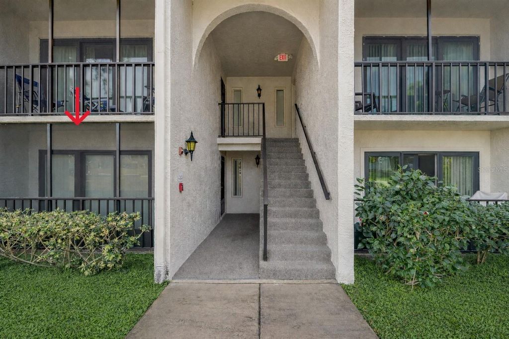 Photo of 1882 Pine Ridge Way W #E1, Palm Harbor, FL 34684 (MLS # TB8463888)