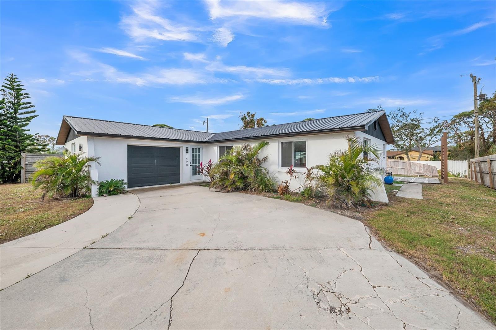 Welcome to this stunning, newly remodeled home located in the heart of Venice, Florida. Every inch of this residence has been thoughtfully updated to provide modern comforts while preserving its timeless charm. From the moment you step inside, you'll be greeted by an open-concept layout featuring brand-new flooring, fresh paint, and a spacious living area perfect for both entertaining and relaxing.
The fully updated kitchen boasts sleek granite countertops, stainless steel appliances, and soft-close cabinetry, making it an ideal space for cooking and hosting guests. The stylish master suite includes a luxurious en-suite bathroom with contemporary finishes, while the additional bedrooms gives ample space and natural light. Step outside to your private, fenced-in backyard—a perfect retreat for outdoor gatherings, gardening, or simply unwinding in Florida's beautiful weather. This home is located just minutes from Venice's world-renowned beaches, shops, restaurants, and local parks, offering both convenience and lifestyle. Don't miss the opportunity to make this beautifully remodeled property your own. Schedule a tour today and experience the best of Venice living