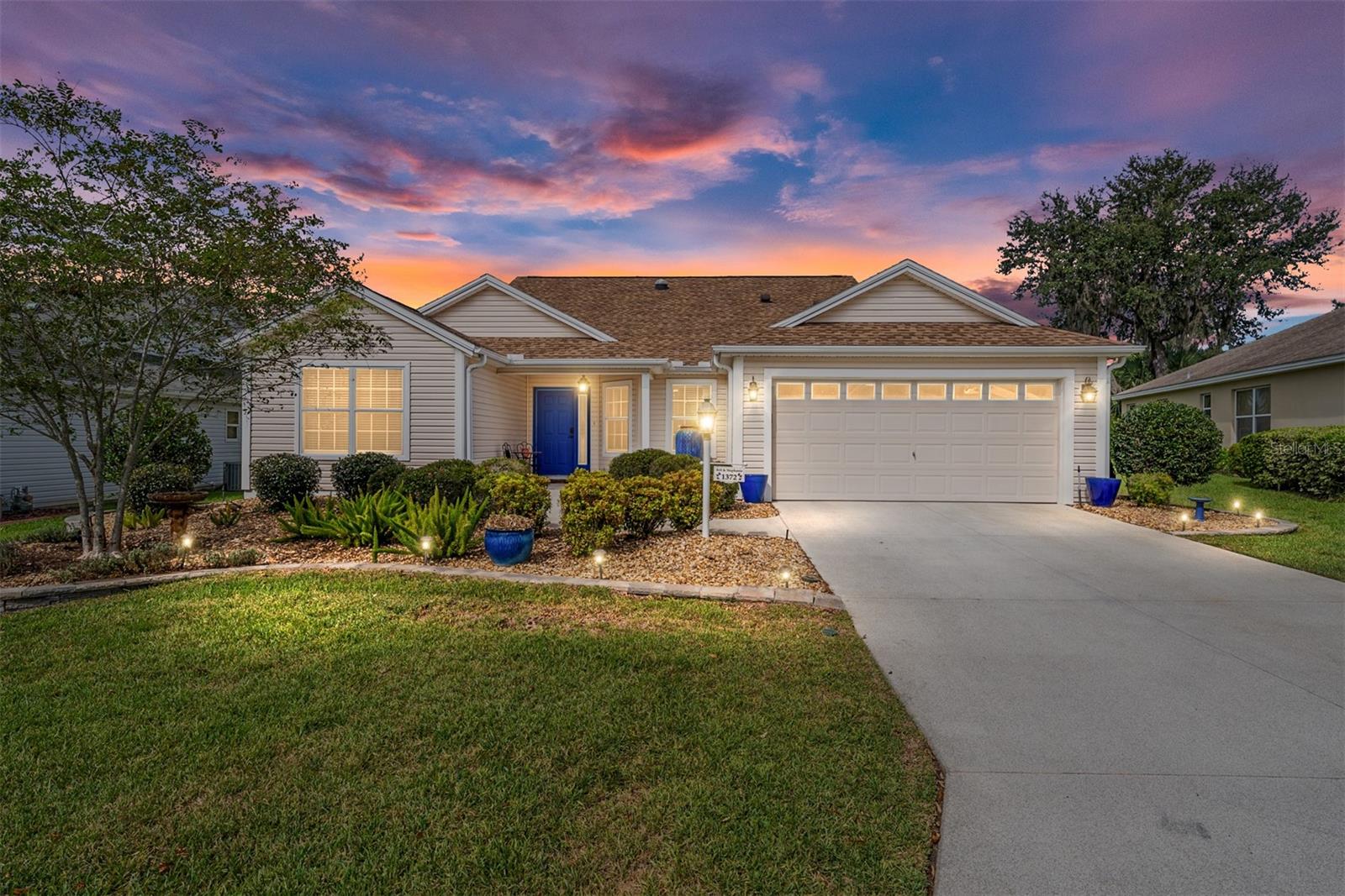 Stunning Designer -TURNKEY Camellia (Gardenia) 3BR/2BA Home PLUS golf cart in the Village of Sunset Pointe - The Villages – ROOF 2021!
Welcome to your beautifully updated 3-bedroom, 2-bathroom dream home nestled in the heart of The Villages! With 2,107 sq ft of professionally designed interior living space, this home blends comfort, style, and convenience in one perfect package.
Step inside to find rich hardwood floors, quartz countertops, and stainless steel appliances in a gourmet kitchen that will thrill any culinary enthusiast. Thoughtfully designed with entertaining in mind, this kitchen is fully equipped to impress even the most discerning diner.
The primary suite offers an oasis of relaxation, featuring a zero-entry walk-in shower, luxurious finishes, and a tranquil ambiance designed for restful nights. The guest bedroom is equally inviting, while the third bedroom, currently styled as a home office, showcases exceptional designer touches and versatility for your lifestyle needs.
Enjoy year-round comfort in the enclosed lanai, under full heat and air, complete with blinds and drapes for added privacy. This serene space overlooks a peaceful greenbelt view, making it the ideal spot for morning coffee, a good book, evening cocktails, or lively card games with friends.
Location is everything—and this home has it all! Just minutes from Sumter Landing and a short ride to Brownwood Town Square, you’ll have easy access to shopping, dining, live entertainment, and more. The Miona and Seabreeze Regional Recreation Centers are within walking distance, while two nearby country clubs and executive golf courses—including one practically in your backyard—put leisure and recreation at your doorstep.
Living in The Villages means access to:
• Nearly 800 holes of golf
• Over 100 swimming pools
• More than 3,000 clubs and classes
• Abundant restaurants, shopping, and healthcare facilities
Don’t miss your opportunity to own this gorgeous, move-in-ready home in one of Florida’s most sought-after active lifestyle communities. Schedule your private showing today—and start loving your new life in The Villages!