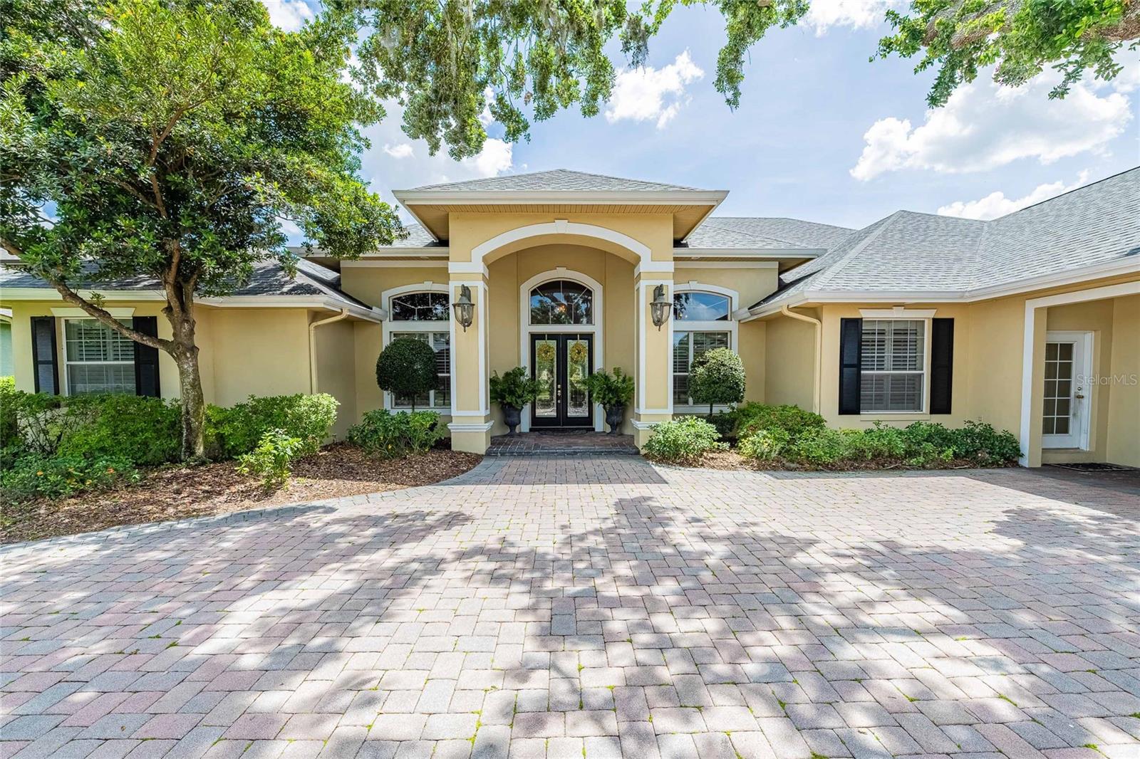 Welcome to 645 Whisper Woods Drive, a stunning estate located in the highly sought-after, gated golf course community of Eaglebrooke in South Lakeland. This beautifully appointed residence with golf course frontage offers almost 4500 square feet of luxurious living space, designed with both comfort and sophistication in mind. Featuring four spacious bedrooms, five full bathrooms, designated office and multiple bonus rooms, each bedroom includes its own en-suite bathroom, offering privacy and convenience for both family and guests.
The heart of the home is a gourmet kitchen equipped with solid wood cabinetry, solid surface countertops, and top-of-the-line appliances. An open-concept layout seamlessly connects the kitchen to the main living and dining areas, creating a warm, welcoming environment ideal for entertaining and everyday living. High ceilings, elegant crown molding, and large windows enhance the home's bright and airy ambiance.
Two of the bedrooms are close in proximity to an additional bonus room that would make a perfect game room or extra family room.
A dedicated media or bonus room adds versatility, providing the perfect space for a home theater, game room, or office. Step outside to a covered, screened lanai that opens to a beautifully landscaped backyard featuring a sparkling pool and hot tub, and a fully equipped outdoor kitchen—perfect for enjoying Florida’s year-round sunshine. With peaceful views of the Eaglebrooke golf course, this outdoor living space offers a serene setting for both relaxing and entertaining.
Additional features include a spacious three-car garage, a large laundry room, and an abundance of storage throughout the home. Eaglebrooke is a master-planned community known for its championship golf course, 24-hour security, and resort-style amenities. Located near top-rated schools, shopping, and dining, this home offers the perfect balance of luxury, convenience, and Florida lifestyle.