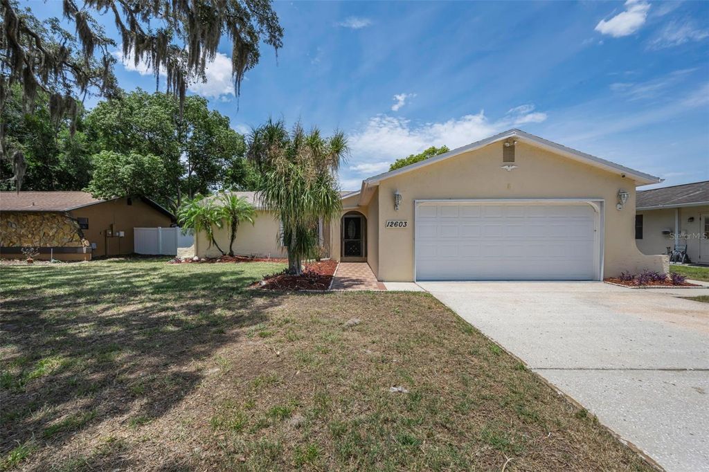 Photo of 12603 Pecan Tree Drive, Hudson, FL 34669 (MLS # W7886373)