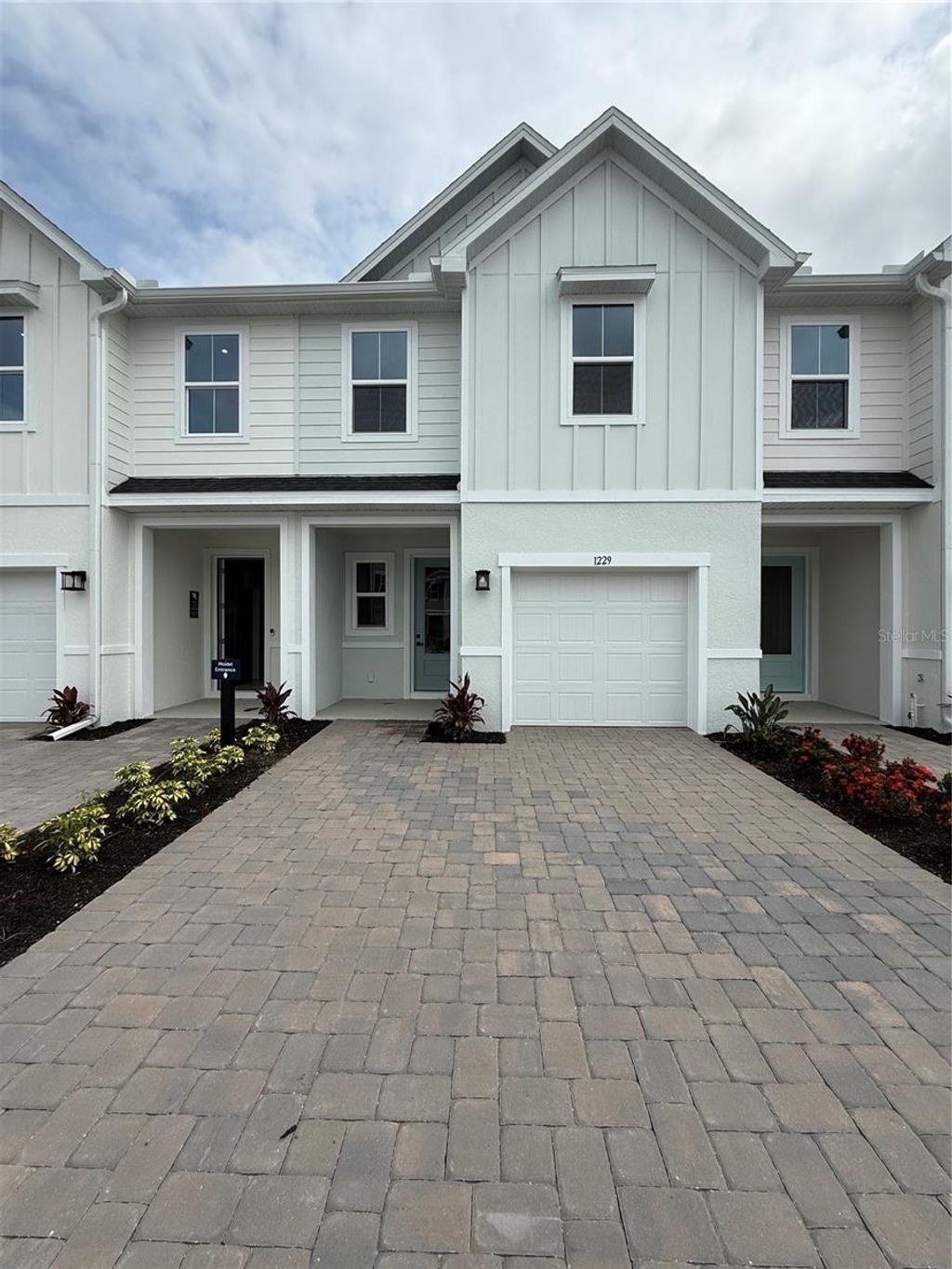 Photo of 1229 Pineywood Field Drive, Davenport, FL 33837 (MLS # W7885337)
