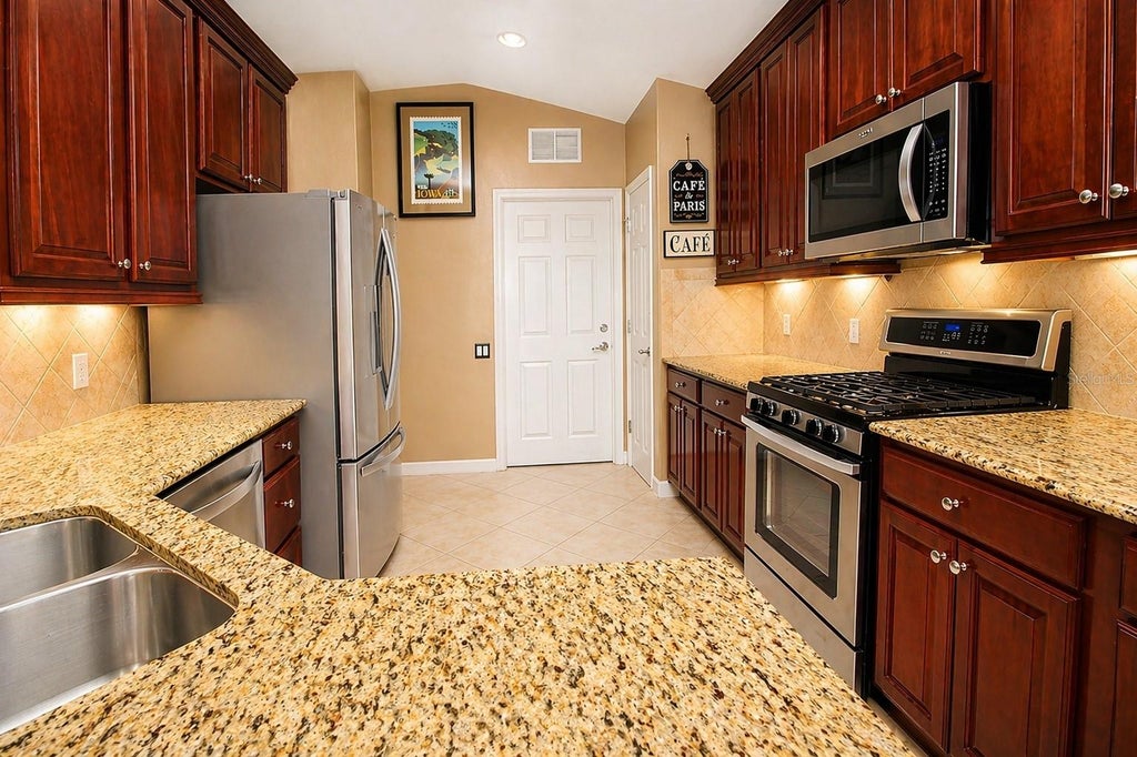 Photo of 516 Lago Loop, Davenport, FL 33837 (MLS # G5119215)