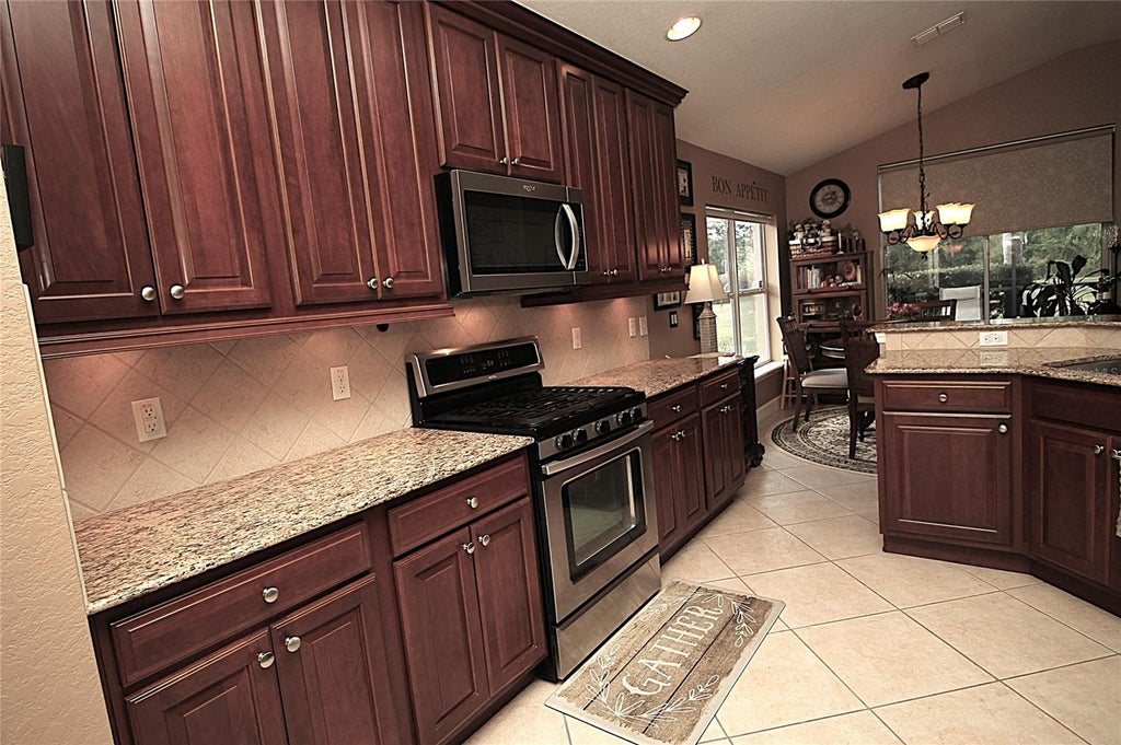 Photo of 516 Lago Loop, Davenport, FL 33837 (MLS # G5119215)