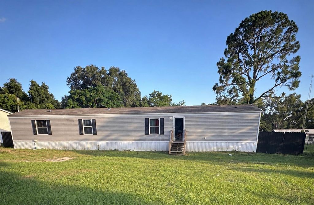 Photo of 10350 SE 127th Lane, Belleview, FL 34420 (MLS # S5152382)