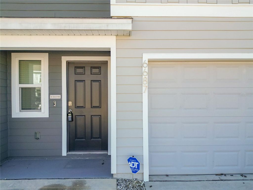 Photo of 6687 SW 81st Loop, Ocala, FL 34476 (MLS # O6376856)