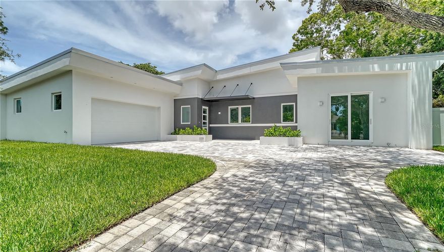 This exquisite new-construction modern residence by Milano Homes, situated on an expansive double lot in the heart of Sarasota, blends elegance, convenience, and investment opportunity. Located within Sarasota city limits, this property qualifies for weekly rentals in one of the area’s most in-demand markets—a highly desirable option that allows for strong income in $160K to $180K range annually. This single-story home offers the ultimate in comfort with no stairs to navigate, featuring four spacious bedrooms, three-and-a-half designer bathrooms, and a two-car garage. The outdoor living space is a private sanctuary, complete with a sparkling pool and spa, outdoor shower, and a large fenced yard ideal for both relaxation and entertaining. As with all Milano Homes, the interiors showcase exceptional craftsmanship and imported Italian finishes. From the state-of-the-art kitchen—equipped with Subzero refrigeration, a Wolf induction cooktop, and Wolf oven—to the custom Italian cabinetry, fixtures, and flooring, every detail exudes sophistication. The open-concept living area flows seamlessly into the outdoor retreat, creating the perfect setting for gatherings and indoor-outdoor living. Perfectly positioned, this property offers easy access to the newly extended Legacy Trail, making it a haven for bikers, runners, and nature lovers. Downtown Sarasota’s vibrant arts, dining, and marina scene is just minutes away, while Siesta Key’s award-winning beaches and St. Armands Circle’s luxury shopping and dining are only a five-minute drive. Whether you’re seeking a full-time residence, seasonal retreat, or an income-producing short-term rental, this home offers an unmatched opportunity to enjoy and invest in the Sarasota lifestyle. Work hand-in-hand with the dedicated Milano Homes professionals to personalize this custom residence, creating a one-of-a-kind dream home tailored just for you. Seller Financing Available.