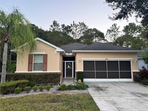 Photo of 11048 Paradise Point Way, New Port Richey, FL 34654 (MLS # TB8560977)