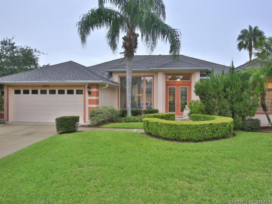 PLANTATION BAY. Leaded double door entry opens into beautiful customized and very desirable ICI Ashley. Palladium window and window seat in LR overlook pool and water view with fountain. White raised panel cabinets in kitchen, flat surface range, granite counters. Reverse osmosis drinking water. Corner window in breakfast room affords great pool and lake view. Gas fireplace in 3 ft. expanded family room with sliding glass doors to lanai. No propane tank at this time. Master Bedroom has tray ceiling. Extended Master Bath has dual vanities, glass block window over tub and not one, but two walk-in closets Cheerful guest room and guest bath. Second guest room set up as office with queen size Murphy bed. Relax outdoors around solar heated pool and spa under spacious L shaped porch. More...