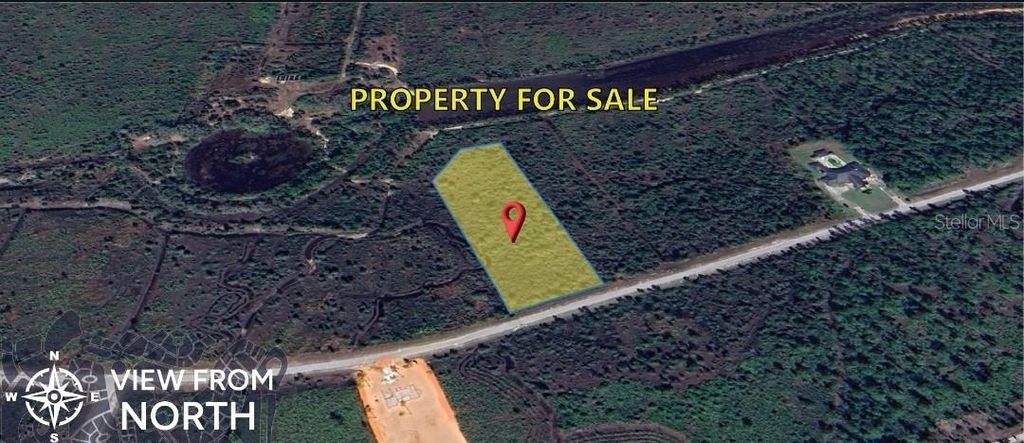 Photo of 70 Meadow Lark Boulevard, Indian Lake Estates, FL 33855 (MLS # OM699056)