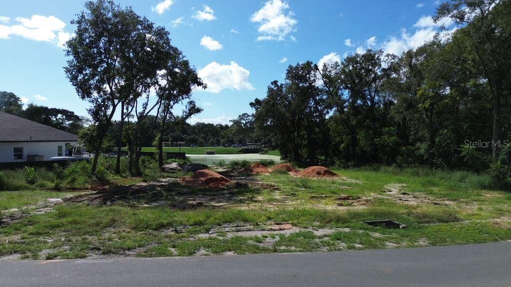 Prime waterfront lot in Orlando offering a rare opportunity to build your dream home or create a strong investment property. With no HOA restrictions, you'll have the freedom to design and build without limitations. The lot comes with completed building plans and a survey, saving you valuable time and money. Enjoy peaceful water views and stunning sunsets while embracing the Florida lifestyle right from your backyard.
