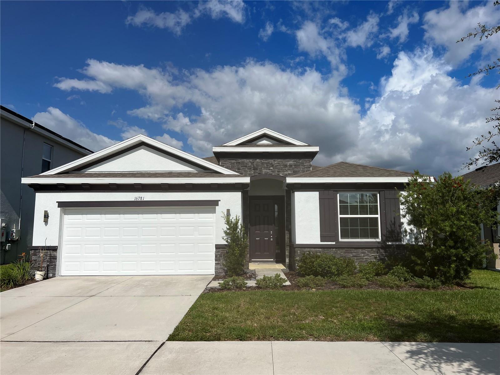 Welcome to this stunning 4-bedroom, 2.5-bathroom home which is sure to impress with its beautifully spacious open-concept design and thoughtful details. High ceilings 9'4" enhance the sense of space, adding to the home’s comfortable feel. The backyard faces ponds and woods, blocking sight from surrounding houses, making it one of the most private locations in the community. The house contains no carpet throughout, only tile in the common area, and luxury water proof 12" thick vinyl flooring for all the bedrooms. The abundance of natural light creates a bright and airy atmosphere, making every room feel inviting and warm. The split floor plan ensures privacy, with the master suite ideally positioned away from the other bedrooms. This home offers a perfect blend of luxury, style, and convenience, step inside and be captivated by the elegant and spacious living areas. The kitchen is a chef's dream, featuring sleek cabinets, granite countertops, and top-of-the-line stainless steel appliances. The master suite is a true retreat, complete with a luxurious en-suite bathroom with both a shower and a garden tub as well as two walk-in closets. The remaining bedrooms are equally comfortable and well-appointed, ensuring everyone has their own private oasis. In addition to the impressive features, this house also has an in-house laundry room. The Creek Preserve community offers a resort-style pool and clubhouse, playground, basketball courts, and miles of sidewalk to walk and bike. This home is also located within Eiruv boundaries and walking distance to places of worship. Location: Off US-301 and FL-674 easy commute to MacDill, Tampa, St. Petersburg/Clearwater, Ellenton, and Bradenton/Sarasota.