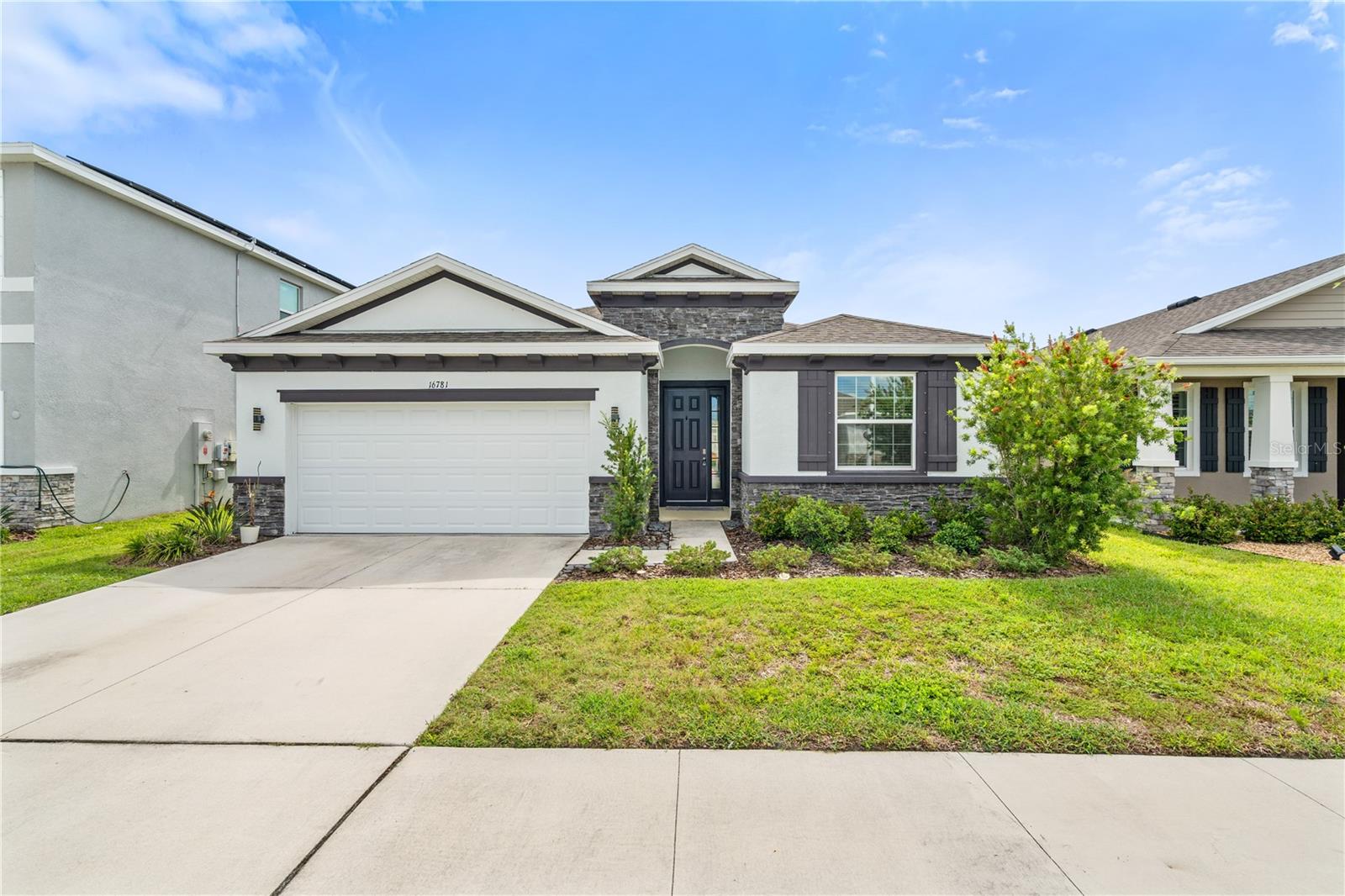 Welcome to this stunning 4-bedroom, 2.5-bathroom home which is sure to impress with its beautifully spacious open-concept design and thoughtful details. High ceilings 9'4" enhance the sense of space, adding to the home’s comfortable feel. The backyard faces ponds and woods, blocking sight from surrounding houses, making it one of the most private locations in the community. The house contains no carpet throughout, only tile in the common area, and luxury water proof 12" thick vinyl flooring for all the bedrooms. The abundance of natural light creates a bright and airy atmosphere, making every room feel inviting and warm. The split floor plan ensures privacy, with the master suite ideally positioned away from the other bedrooms. This home offers a perfect blend of luxury, style, and convenience, step inside and be captivated by the elegant and spacious living areas. The kitchen is a chef's dream, featuring sleek cabinets, granite countertops, and top-of-the-line stainless steel appliances. The master suite is a true retreat, complete with a luxurious en-suite bathroom with both a shower and a garden tub as well as two walk-in closets. The remaining bedrooms are equally comfortable and well-appointed, ensuring everyone has their own private oasis. In addition to the impressive features, this house also has an in-house laundry room. The Creek Preserve community offers a resort-style pool and clubhouse, playground, basketball courts, and miles of sidewalk to walk and bike. This home is also located within Eiruv boundaries and walking distance to places of worship. Location: Off US-301 and FL-674 easy commute to MacDill, Tampa, St. Petersburg/Clearwater, Ellenton, and Bradenton/Sarasota.