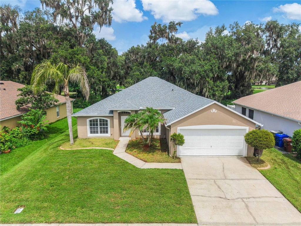 Photo of 2106 The Oaks Boulevard, Kissimmee, FL 34746 (MLS # O6431874)