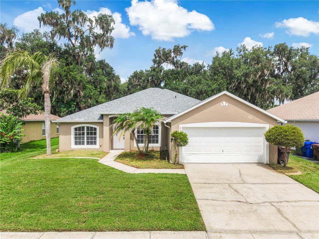 Photo of 2106 The Oaks Boulevard, Kissimmee, FL 34746 (MLS # O6431874)