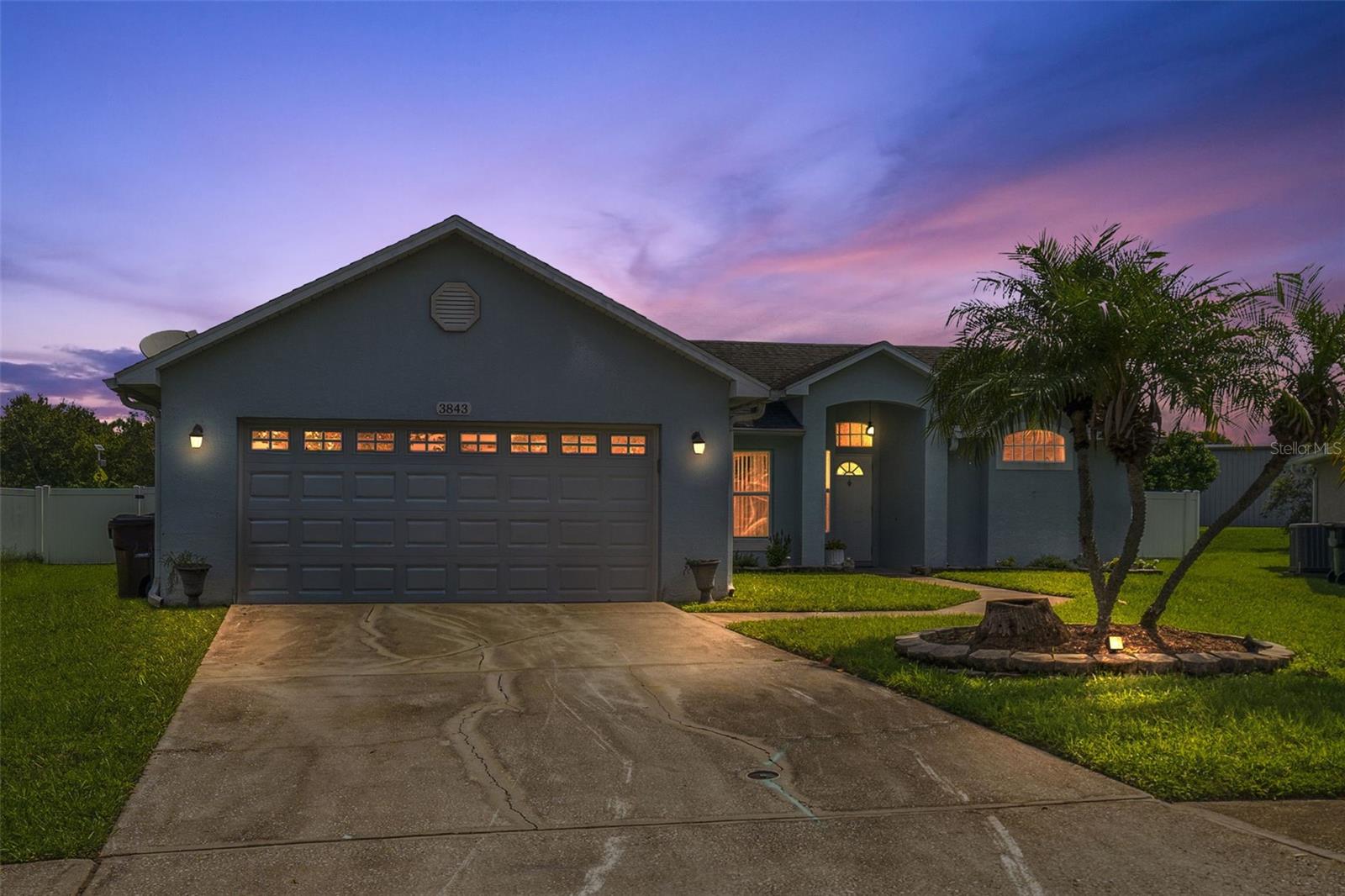 FANTASTIC LOCATION IN SAINT CLOUD'S POPULAR BLACKBERRY CREEK COMMUNITY! This beautiful home features 1,330 square feet of living area with 1,895 total square feet under roof. This home's interior features include: 3 bedrooms and 2 bathrooms, spacious kitchen over looking family room, solid wood cabinets, Eating Space in Kitchen, breakfast bar, newer appliances, open floor plan, cathedral ceilings, Inside Laundry Room with Tub and upper cabinets, Master Suite has a large walk-in closet, garden tub with a shower, private water closet and single vanity with desk. This split plan also has ceiling fans throughout. Exterior features include: Sliders to the back yard covered and screen enclosed patio, over sized 6' vinyl fenced back yard, 2 CAR garage, garage door opener, block construction with stucco. Blackberry Creek Community is centrally located and convenient to so many things...just minutes to the Florida Turnpike, 30 minutes to the Orlando International Airport, West and East coast beaches are only an hour away, area attractions are approximately 40 minutes away, the Lake Nona Medical City is less than 30 minutes away. This home is move-in ready! Call today and setup a home preview!