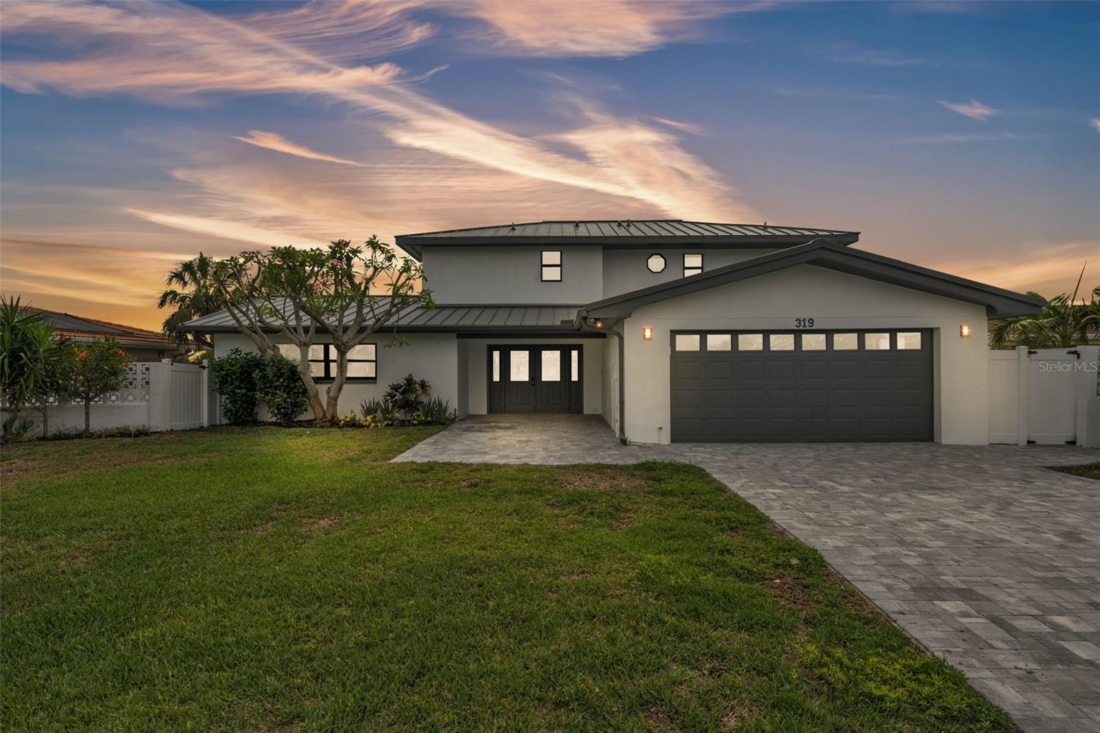 Step outside to your private tropical oasis featuring an updated backyard, pool, decking, and pool system, and enjoy a spacious patio for relaxing or entertaining. This fully remodeled 2,790 sq ft single-family waterfront home includes 4-bedrooms and 3 full baths within exclusive Island Estates. Finishes include a gourmet kitchen with quartz countertops, custom cabinetry, and top-of-the-line stainless steel appliances. Wide-open living spaces are flooded with natural light, through the New impact rated windows and provides a seamless indoor-outdoor flow—perfect for entertaining or quiet sunset evenings. The private dock includes a boat lift, providing instant access to boating, fishing, and waterfront dining.Located just minutes from world-renowned Clearwater Beach, fine dining, and shopping, this Island Estates gem offers the best of luxury and lifestyle in one exceptional package.
Don’t miss your chance to own this done for you, move-in-ready, waterfront paradise!