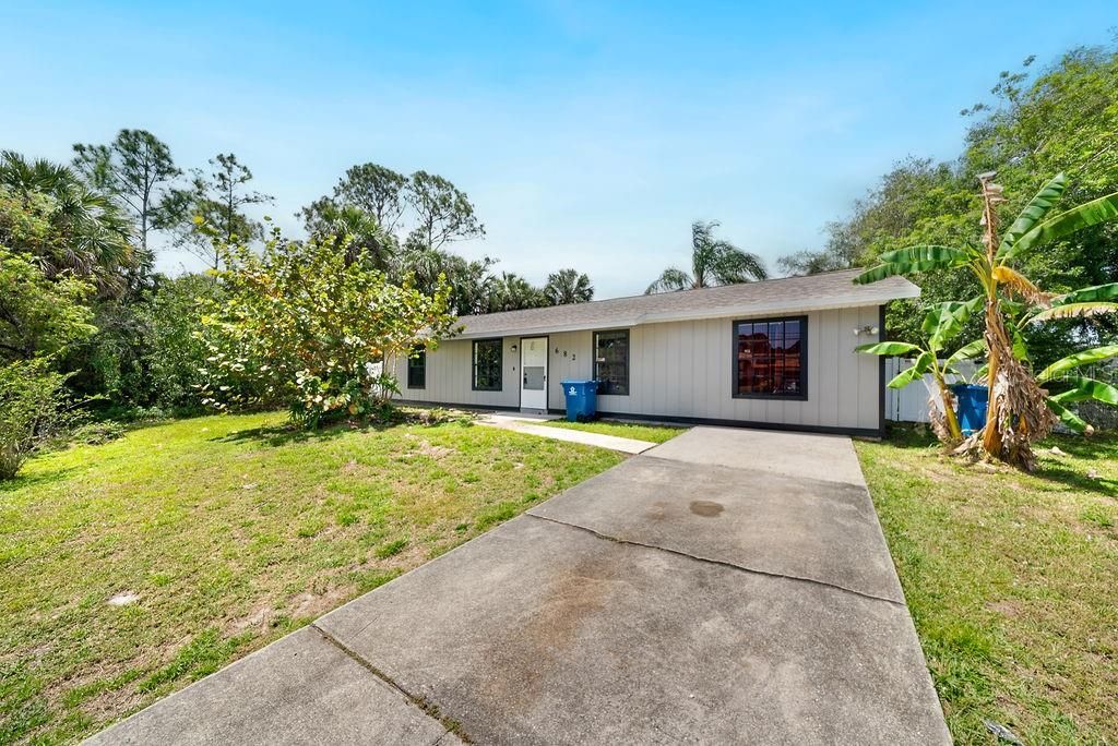 Photo of 682 De Groodt Road SW, Palm Bay, FL 32908 (MLS # O6297308)