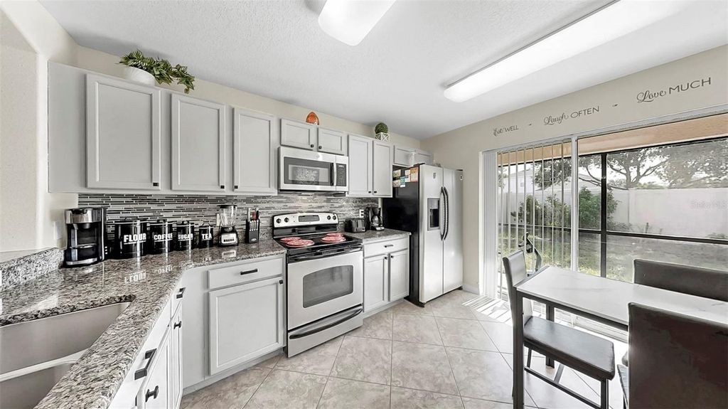 Photo of 7724 Maroon Peak Drive, Ruskin, FL 33573 (MLS # TB8415267)