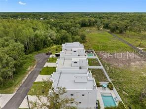 Rare opportunity to secure padded land with water and sewer ready in a prime Tampa location! This parcel sits directly behind newly constructed luxury modern homes, offering an ideal setting for your own custom residence or investment project. Surrounded by a mix of established neighborhoods and new development, the lot combines tranquility with convenience. Enjoy tree-lined views, all while being just minutes from shopping, dining, schools, and major highways for easy commuting. Whether you’re a homeowner ready to build your home or an investor, this property delivers location, potential, and value. Don’t miss your chance to own land in one of Tampa’s desirable growth areas.