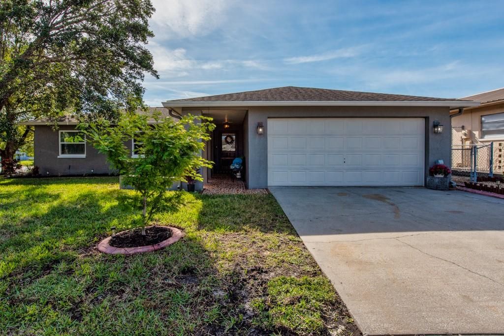 Photo of 8812 Honeycomb Drive, Port Richey, FL 34668 (MLS # TB8459313)