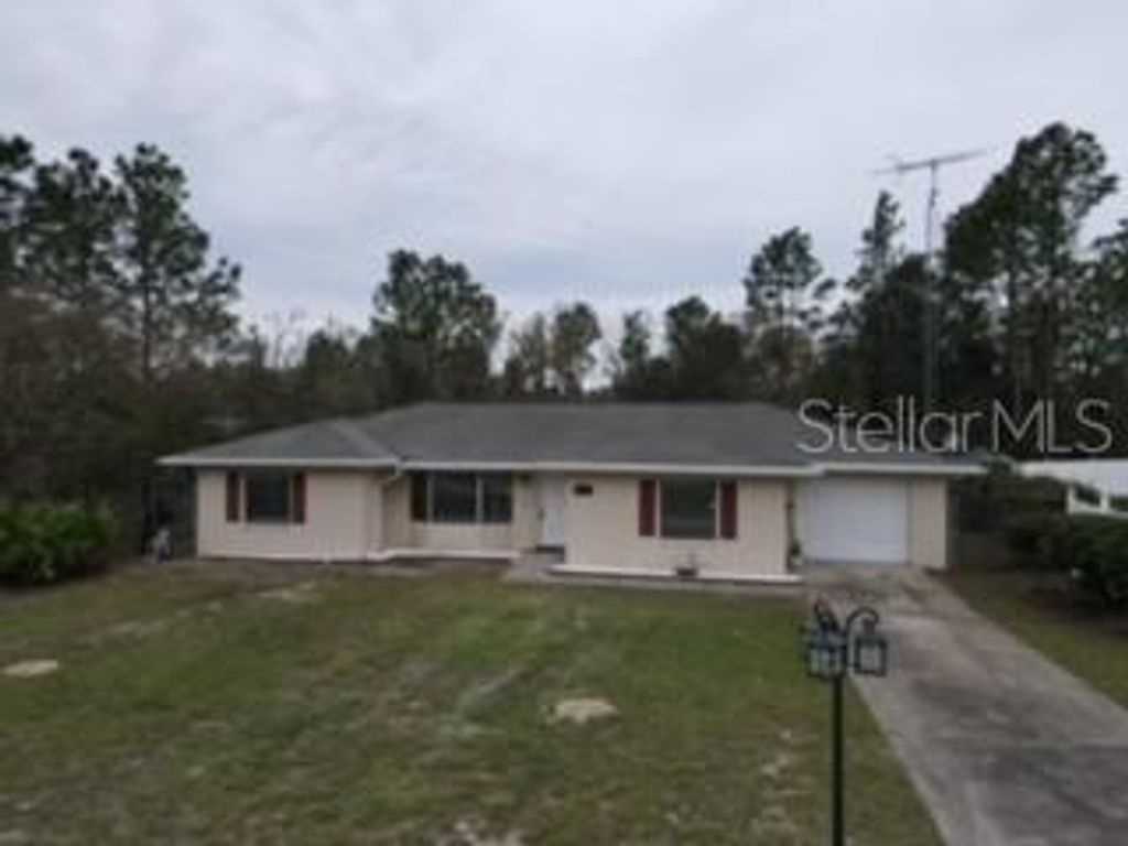 Photo of 6080 SW 154th Lane Road, Ocala, FL 34473 (MLS # OM712730)