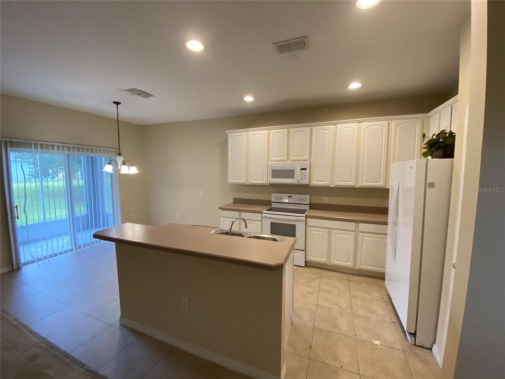 Photo of 3818 Blue Dasher Drive, Kissimmee, FL 34744 (MLS # S5143059)