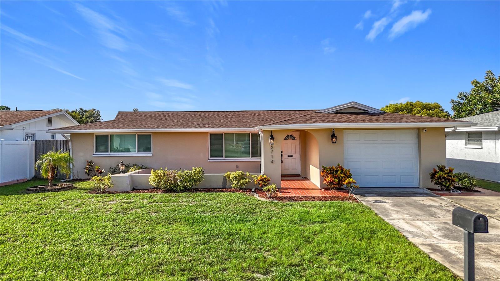 Beautifully updated 2-bedroom, 2-bathroom home in Pasco County featuring a new roof, AC, and water heater (all 2022), plus a new garage door, several replaced windows, and brand-new carpets in both bedrooms. Enjoy a bright, functional layout, spacious living areas, and a low-maintenance yard in a quiet, established neighborhood. Move-in ready! Don’t miss this turnkey opportunity!
