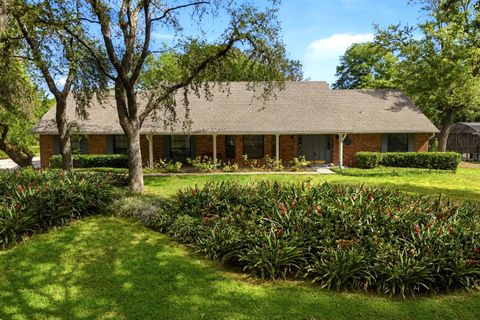 Photo of 7141 Wooded Village Lane, Orlando, FL 32835 (MLS # O6393100)