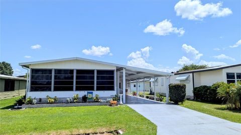 Photo of 6420 Jacaranda Avenue NE, Winter Haven, FL 33881 (MLS # P4935412)