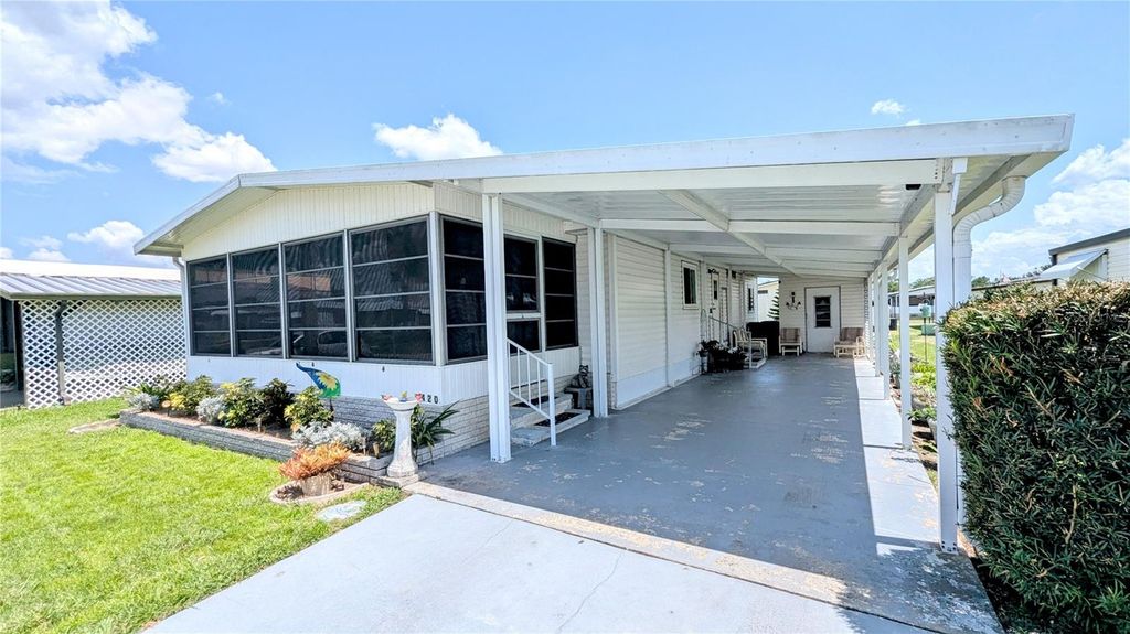 Photo of 6420 Jacaranda Avenue NE, Winter Haven, FL 33881 (MLS # P4935412)