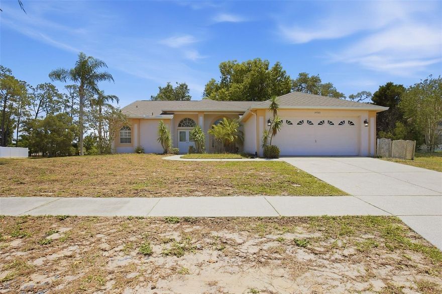 One or more photo(s) has been virtually staged. Located in an established Hudson community, this spacious home offers a comfortable layout with inviting living areas and a functional split-bedroom design. The kitchen opens to the main gathering spaces, creating an ideal setup for everyday living and entertaining. Enjoy additional flexibility with a bright enclosed lanai overlooking the backyard and mature landscaping. Conveniently situated near shopping, dining, golf, parks, and Gulf Coast beaches, this property provides easy access to major roadways while still offering a quiet neighborhood setting. A great opportunity to make this home your own in a desirable Pasco County location.