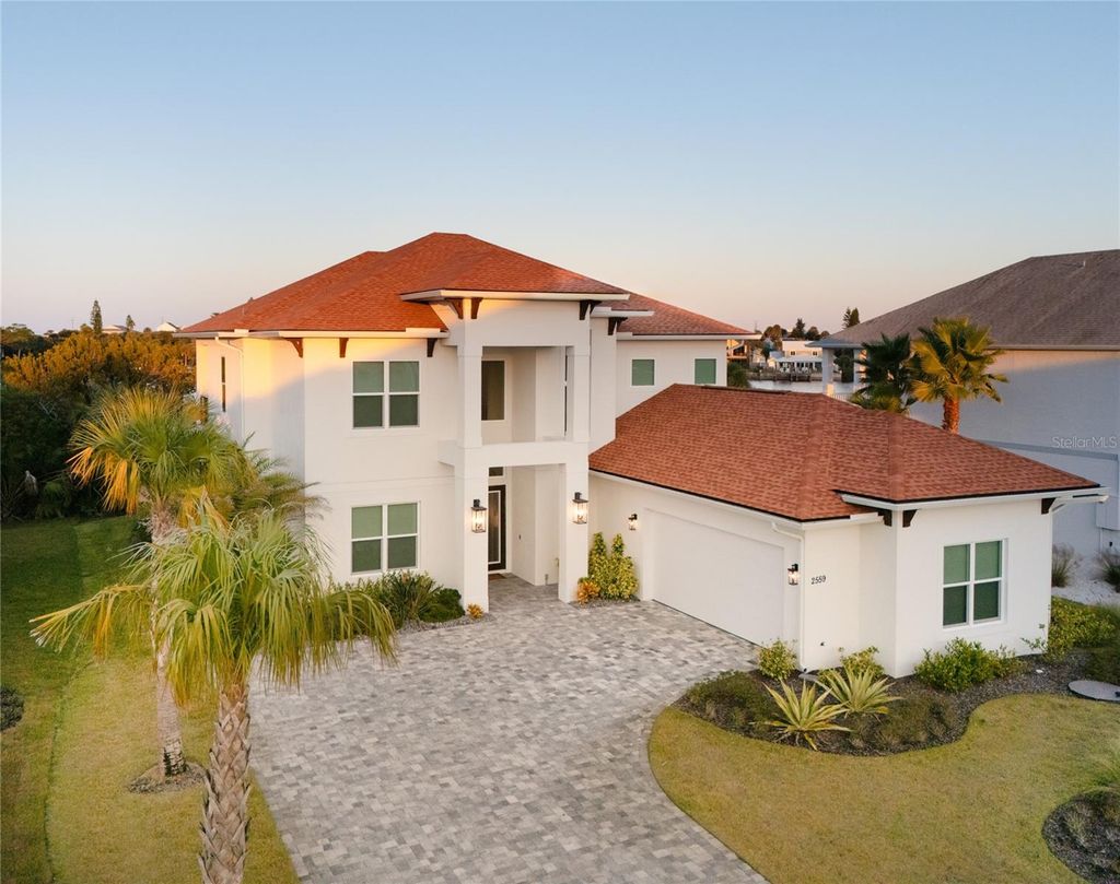 Photo of 2559 Palm Avenue, Flagler Beach, FL 32136 (MLS # FC313877)