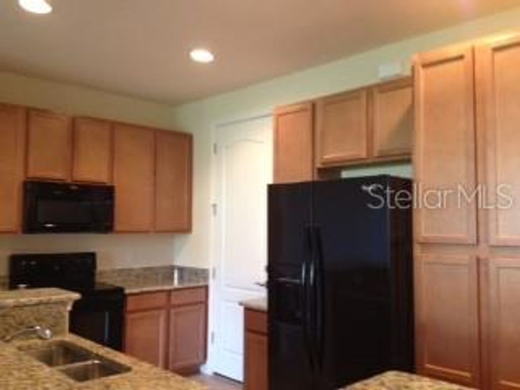 Photo of 8431 Kelsall Drive, Orlando, FL 32832 (MLS # O6398629)