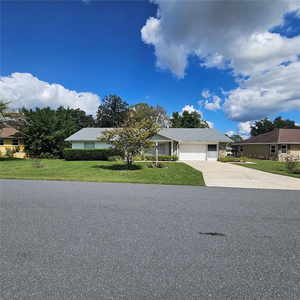 Photo of 879 W Beakrush Lane, Beverly Hills, FL 34465 (MLS # OM712104)