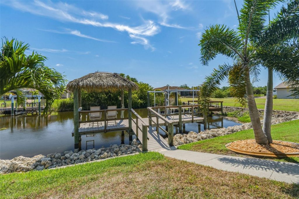 Photo of 9452 Nastrand Circle, Port Charlotte, FL 33981 (MLS # C7524620)