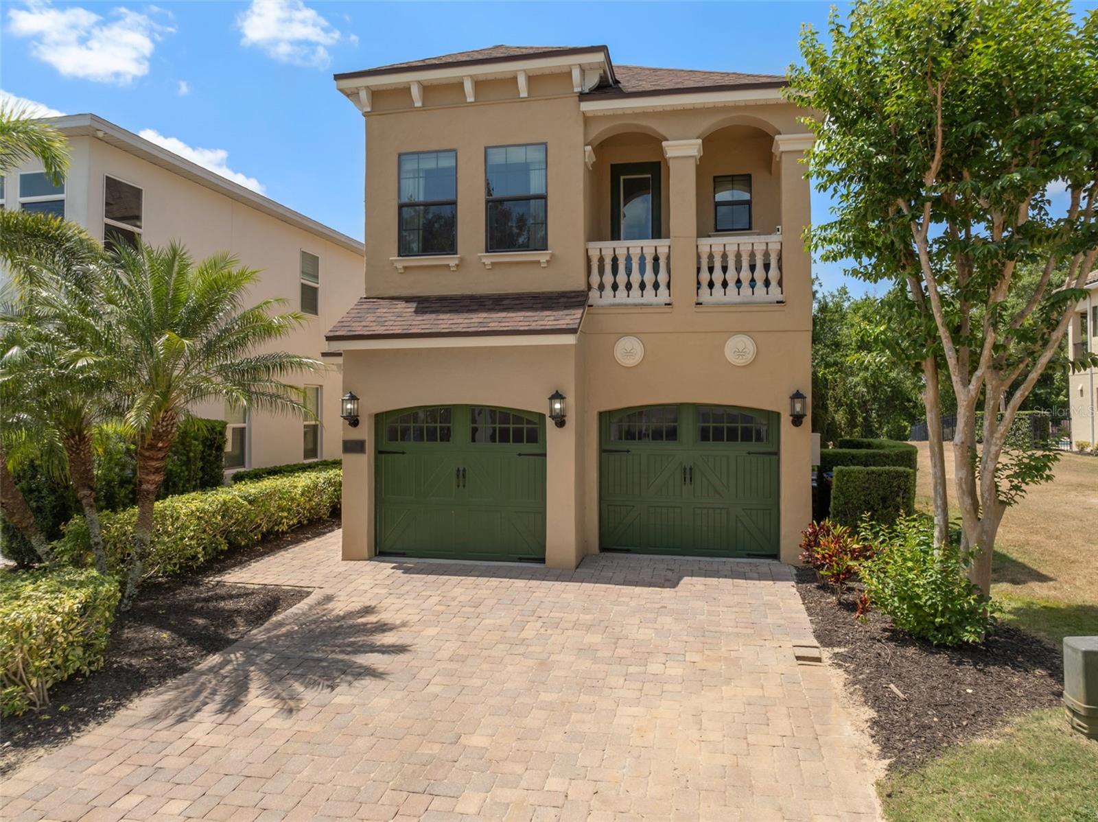Welcome to an extraordinary investment opportunity in the heart of Central Florida’s premier vacation destination—Reunion Resort. This fully furnished 5-bedroom, 5.5-bath luxury home is a turn-key income-producing powerhouse already booked well into 2026, offering immediate returns for the savvy investor. Each bedroom features its own en-suite bath, and the spacious primary suite on the first level boasts dual sinks, a soaking tub, and a separate shower for true resort-style living. Designed for maximum guest appeal, this home features soaring 10-foot ceilings, a dramatic vaulted entry, and an open-concept layout that flows seamlessly from the living space to the kitchen, where granite countertops, stainless steel appliances, 42-inch cabinets, and a large island with a high bar area create a central hub for entertaining. The open space offers lots of windows and a four-panel sliding glass door that floods the home with natural light and opens up to a private pool oasis overlooking a peaceful wooded preserve—ideal for relaxing after a day at the parks. The backyard retreat showcases a heated pool with an attached hot tub spa, surrounded by ample lounge seating for sunbathing, along with a covered patio featuring an outdoor dining table and chairs, and a built-in grill—perfect for entertaining, relaxing, or enjoying Florida’s sunshine year-round. Recent upgrades include a new roof in 2020, a new pool pump and heater in 2023, an AC pipe cleaning system installed in 2024, and a brand-new washer and dryer in 2025, ensuring the property is not only beautiful but also meticulously maintained. The home comes fully furnished and includes a Ring doorbell and exterior security cameras for added peace of mind. With a two-car garage and additional driveway parking, this home is ready to host multiple guests or extended family comfortably. A key highlight of this property is the collection of professionally designed themed bedrooms that elevate the guest experience and enhance rental appeal. Guests can set sail in the vibrant Captain Mickey suite, drift into tranquility in the breezy nautical-inspired room, unwind in the lush jungle retreat, feel like royalty in the elegant princess escape, or dream of adventures in the globally inspired travel-themed room with double beds—each one crafted to delight guests of all ages. Centrally located on the second floor is a dedicated theatre and game area featuring nine plush theatre chairs, blackout curtains, and ample space for relaxation or movie nights, making it a true entertainment hub. Reunion Resort delivers a five-star experience with championship golf courses, multiple resort-style pools, a water park with a lazy river, on-site dining, miniature golf, tennis courts, a fitness center, and miles of walking trails. Just minutes from Disney and with quick access to I-4, 429, and 192, this home checks every box for an investor seeking consistent rental income in a high-demand location. Whether you're looking to expand your short-term rental portfolio or secure a magical family retreat with exceptional earning potential, this is the opportunity you've been waiting for!