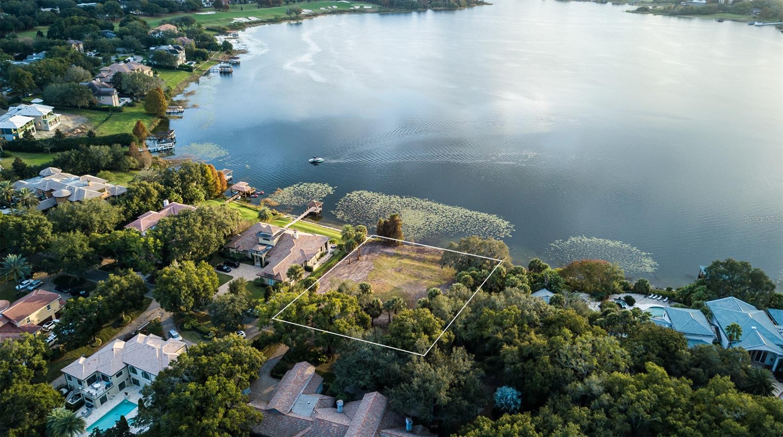 Discover one of the last remaining lakefront home sites in the renowned Isleworth Golf & Country Club. Nestled on a cul-de-sac along the shores of beautiful Lake Bessie, this 0.67-acres home site offers a peaceful setting and 131 feet of water frontage. Gorgeous lake views will be enjoyed through the custom estate to be built by Stonebridge Homes on this exquisite lakefront lot.