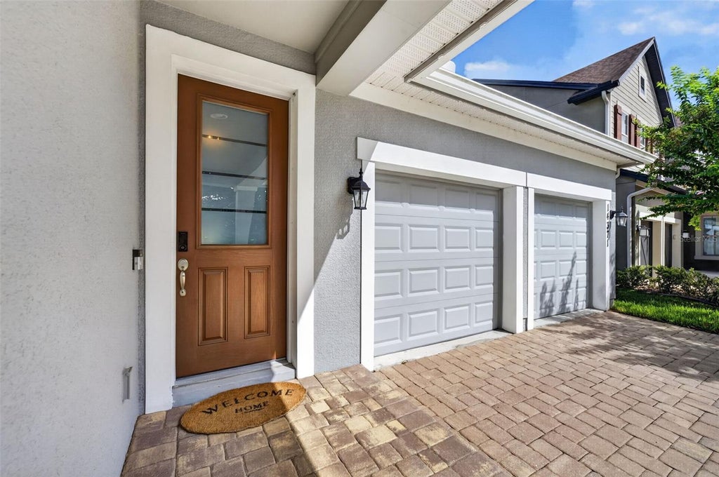 Photo of 14371 Shocklach Drive, Winter Garden, FL 34787 (MLS # O6443368)