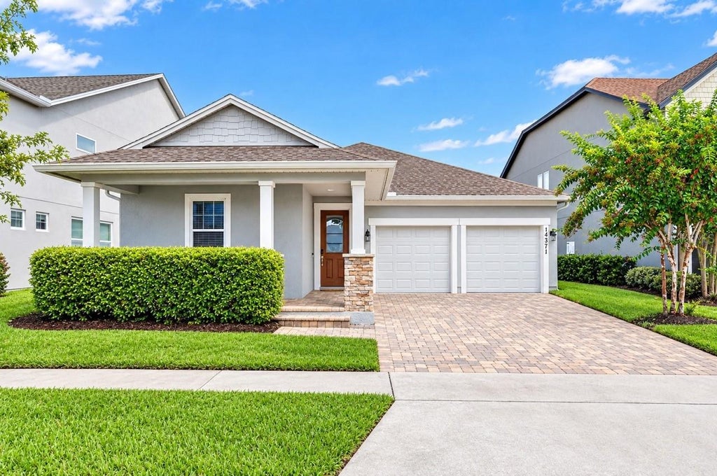 Photo of 14371 Shocklach Drive, Winter Garden, FL 34787 (MLS # O6443368)