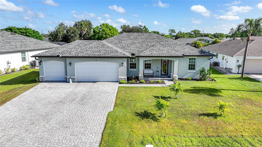 Stunning 2023 Pool Home in Deep Creek. Located in the highly sought-after, deed-restricted community of Deep Creek, this newly built 2023 POOL home combines quality craftsmanship with modern Florida living. This spacious 4-BEDROOM, 2-BATH residence features a 3-CAR GARAGE with EPOXY FLOORING, dimensional roof shingles, decorative STONE ACCENTS on the front elevation, a PAVED DRIVEWAY, and a screened, PAVED LANAI. Step inside and you’ll immediately notice the open-concept design with soaring 9’4” tray ceilings, 8-foot doors, and 12x24 TILE FLOORING THROUGHOUT — with no carpeting. The chef’s kitchen boasts a large CENTER ISLAND with seating area, GRANITE countertops, raised panel cabinetry with soft-close doors, stainless steel appliances, and a CLOSET PANTRY. The GREAT ROOM flows seamlessly to the oversized, screened lanai, perfect for entertaining or relaxing by your SALTWATER HEATED POOL with a zero-entry SLOPED DESIGN for easy access. This split floor plan offers an office, two guest bedrooms with double-door closets and ceiling fans, and a full guest bath with granite counters, tub and shower combo. The luxurious primary suite features tray ceilings, his-and-hers closets, private lanai access, and a glass walk in shower with dual sinks and granite countertops. Additional highlights include: PGT HURRICANE IMPACT  insulated windows
• Remote-operated Kevlar screens on the lanai
• Sprinkler system and seamless gutters
• 50-amp hookup for a portable generator
Tucked away on a quiet cul-de-sac, this home offers exceptional value, quality, and location — making it one of the best finds in Deep Creek.
