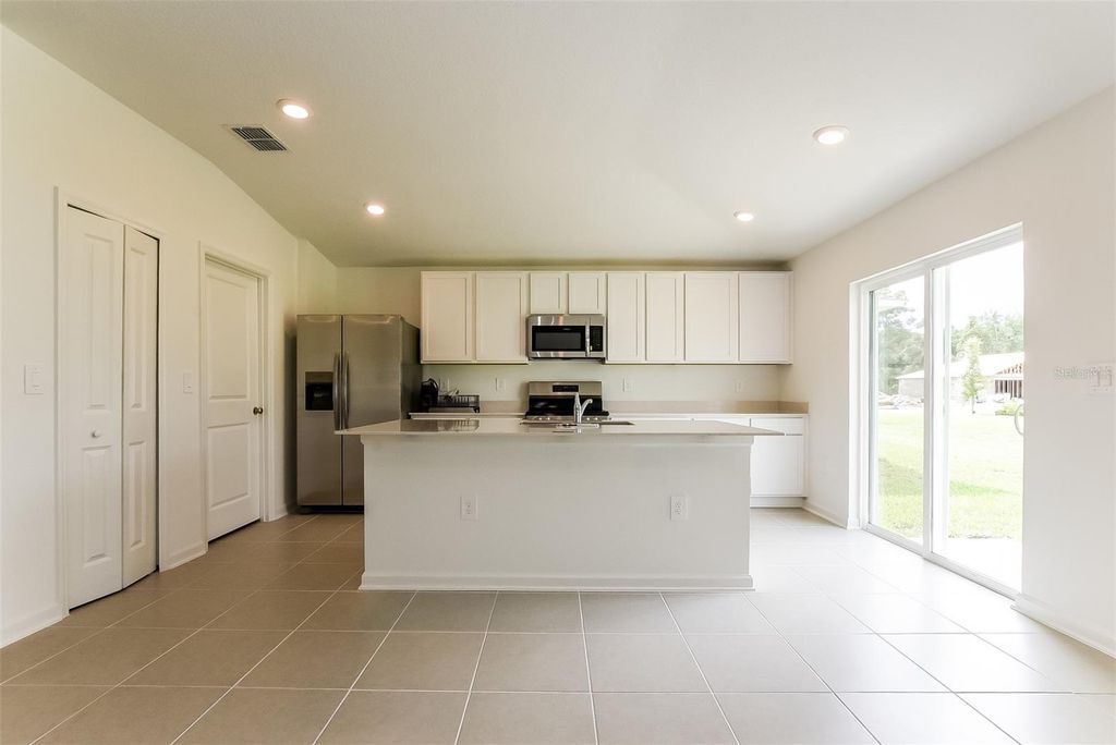 Photo of 1309 Hammock Reserve Drive, Deland, FL 32720 (MLS # O6357894)