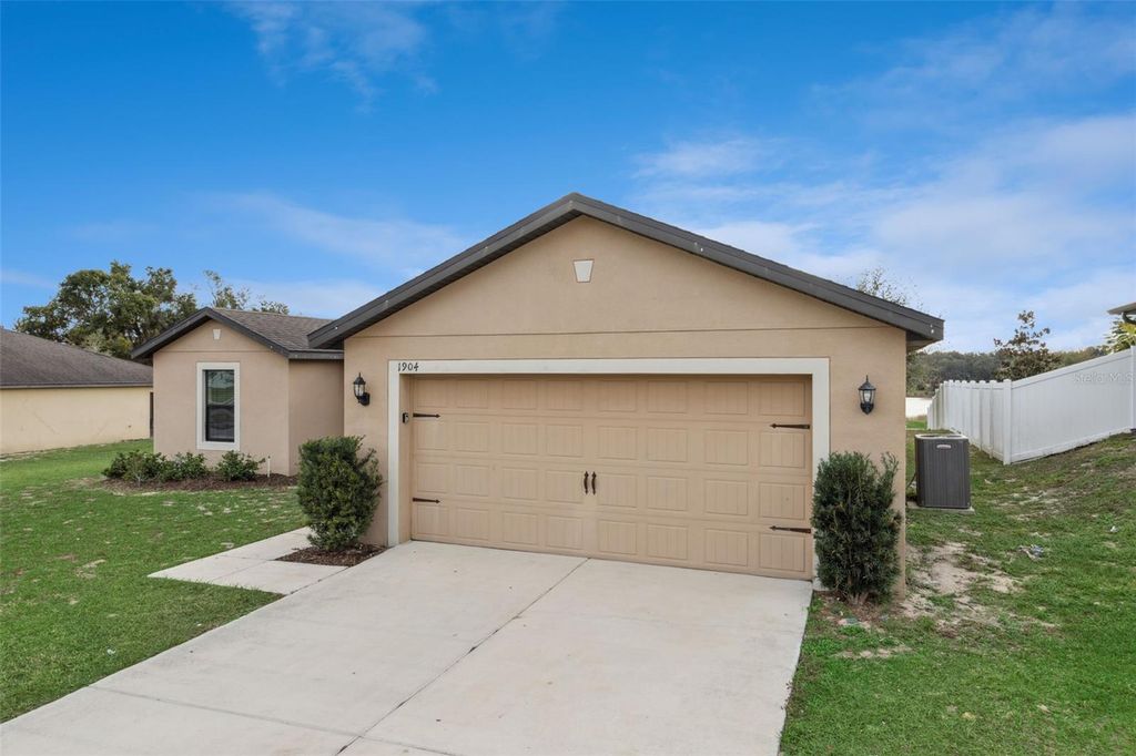 Photo of 1904 Piedmont Court, Mascotte, FL 34753 (MLS # O6367639)