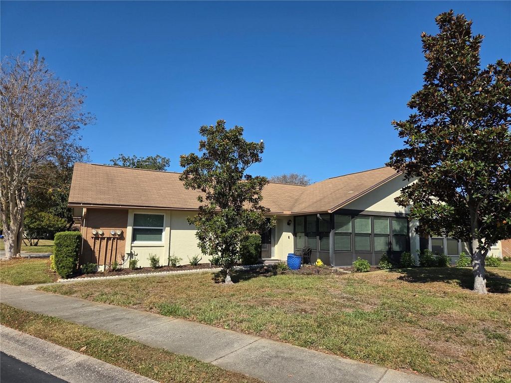 Photo of 1342 Stonehaven Lane, Dunedin, FL 34698 (MLS # TB8449642)