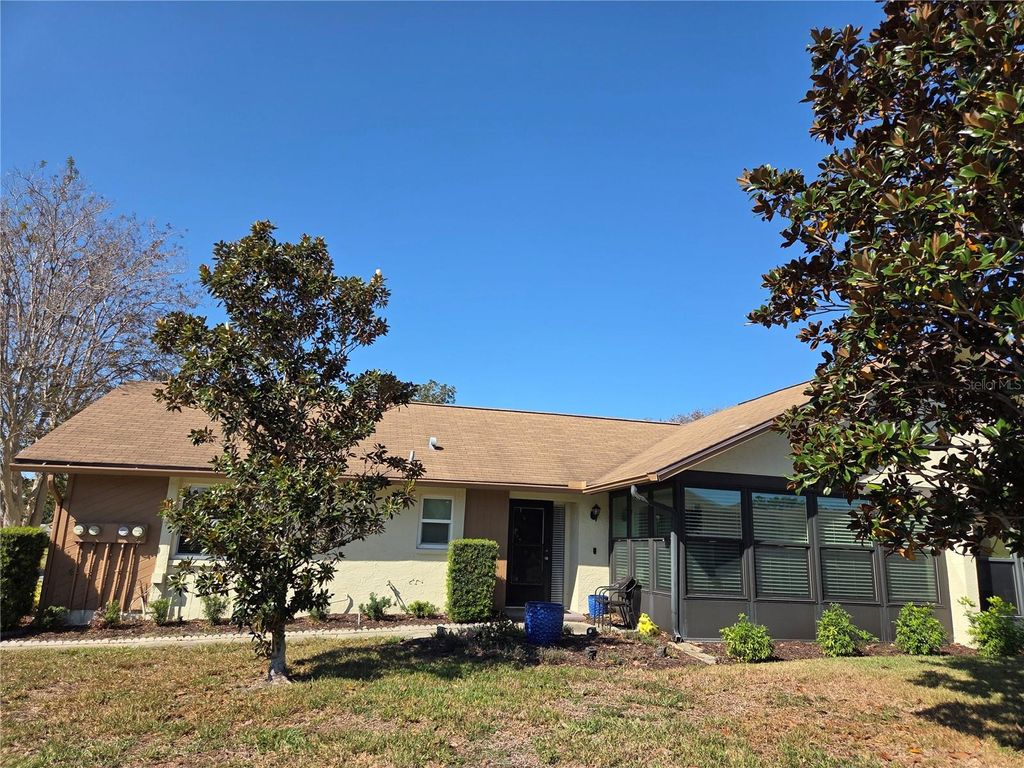 Photo of 1342 Stonehaven Lane, Dunedin, FL 34698 (MLS # TB8449642)