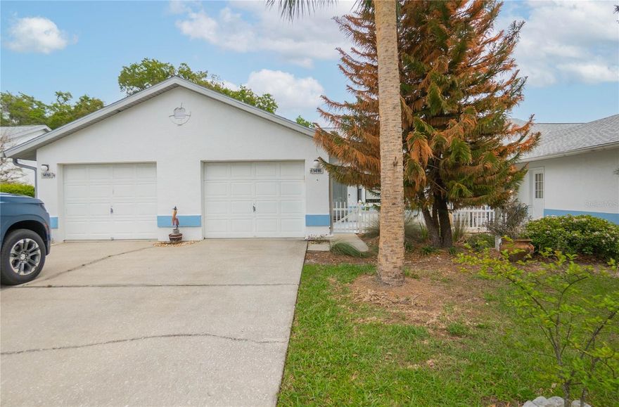 Nestled in a peaceful Inverness setting, this 2-bedroom, 2-bath home with a one-car garage showcases beautiful views of Little Lake Spivey, the kind that quietly steal the spotlight and keep you coming back for one more look. A private courtyard entrance sets the tone, offering both charm and a sense of retreat. Inside, soaring ceilings and an open layout create a bright, airy feel, with spacious living and dining areas that flow effortlessly toward the outdoors. The kitchen features stainless steel appliances, and a convenient pass-through design that keeps you connected to the main living space. A sunny breakfast nook with bay windows is the perfect spot to start your day. The primary suite is generously sized a walk-in closet, and an updated ensuite bath showcasing a modern double vanity and sleek walk-in shower. A well-appointed second bedroom offers flexibility for guests or a home office.
Step out to the all weather lanai and enjoy peaceful green space paired with serene views of Little Lake Spivey, a natural backdrop that brings calm to everyday living.  Little Lake Spivey is connected to the Apopka chain of lakes making it possible to explore other nearby lakes.
Residents also enjoy access to a community pool and nature walk, boat storage and ramp for boat access to the water, adding to the easy, low-maintenance Florida lifestyle.
Comfort, convenience, and water views that truly deliver, all wrapped into one inviting package.