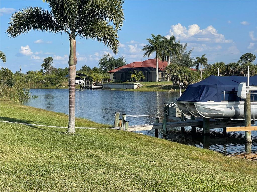 Photo of 15035 Ingraham Boulevard, Port Charlotte, FL 33981 (MLS # C7520319)